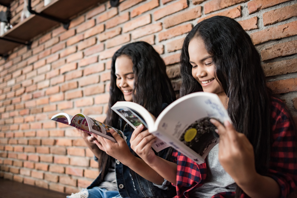 students reading a book