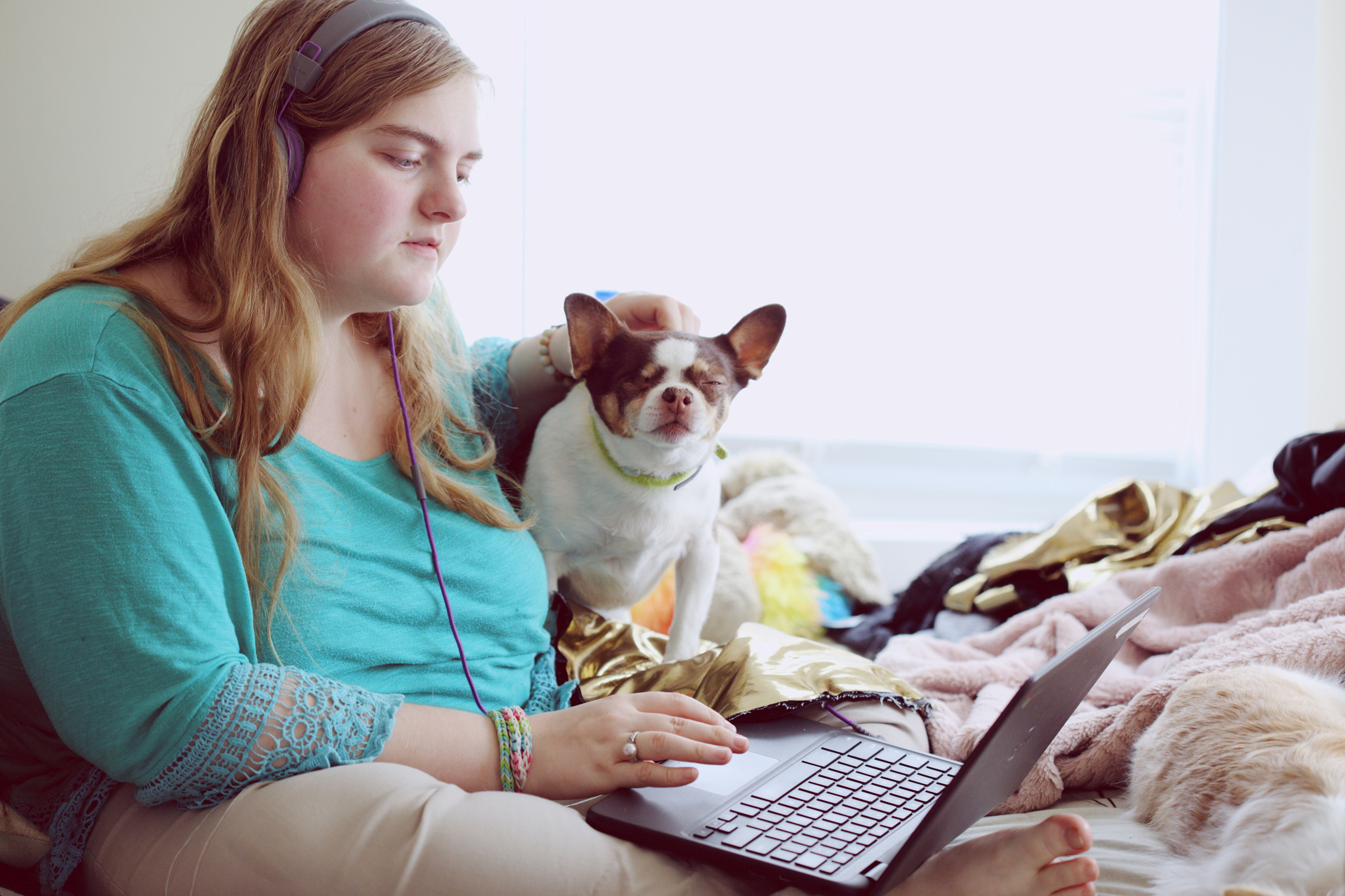 watching a movie with her dog