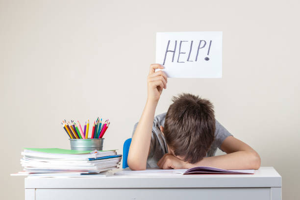 Boy struggling in her study